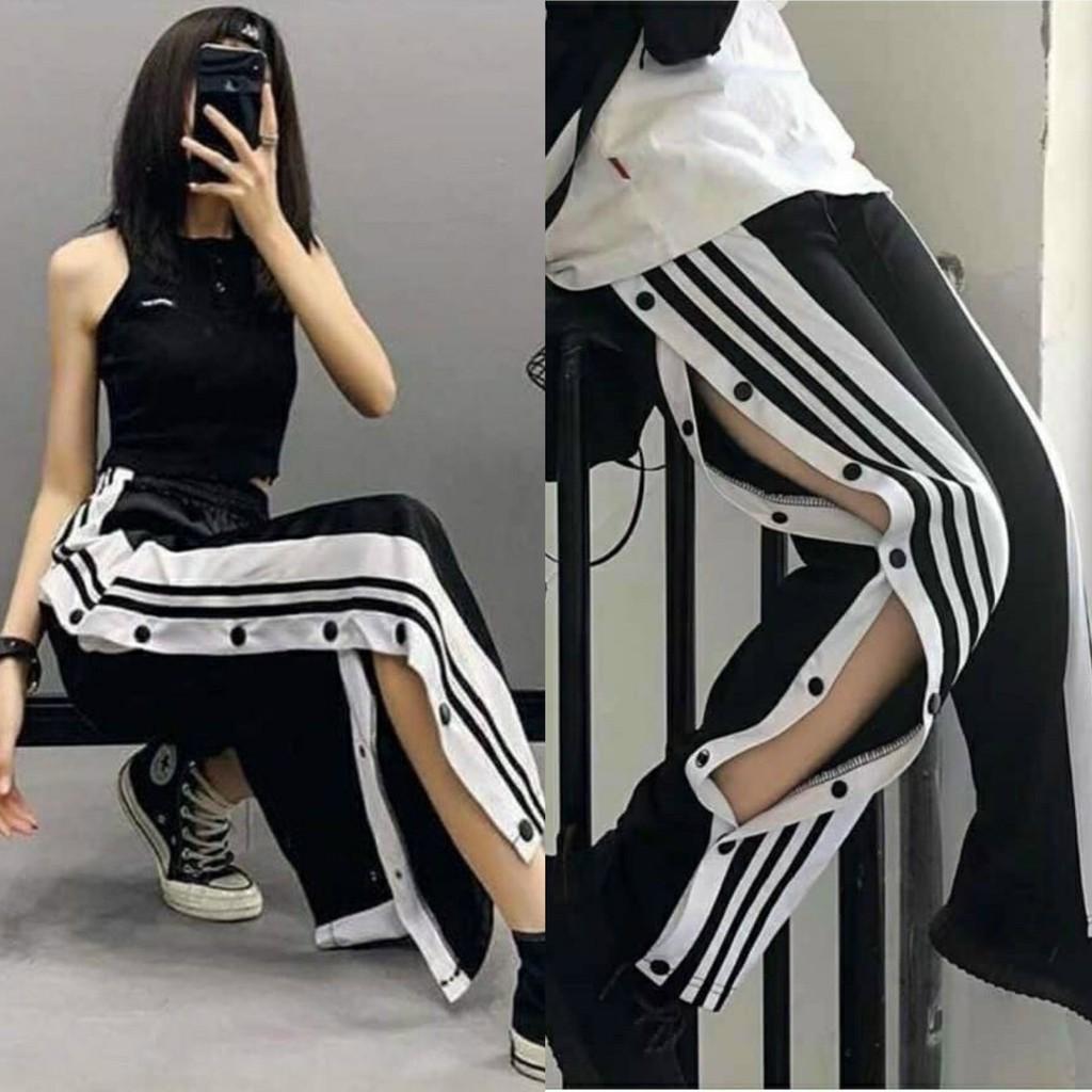 Quần Thun Ống Rộng Chạy Viền Xẻ Tà Nút Bấm