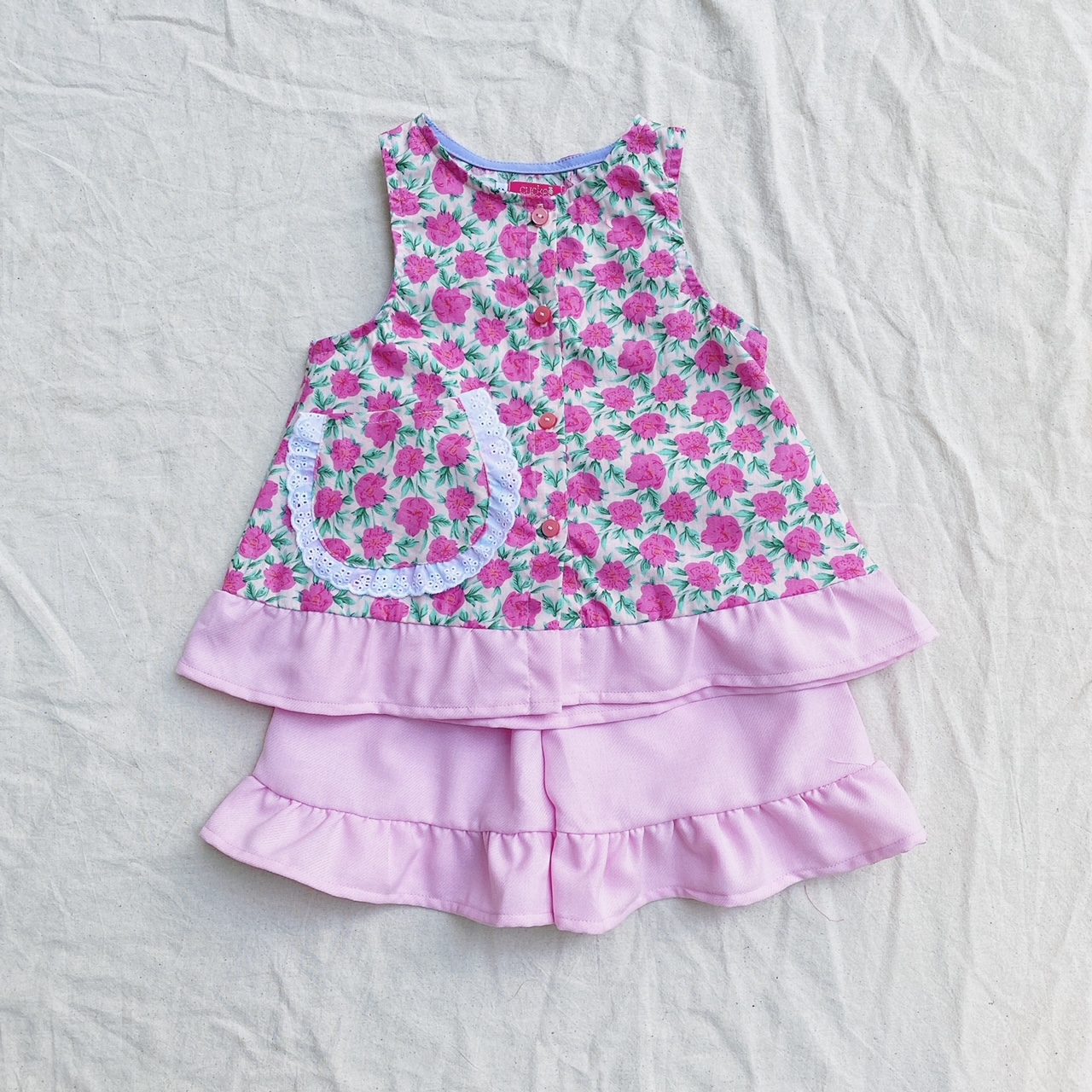 SEt áo xòe sát nách quần ngắn bé gái