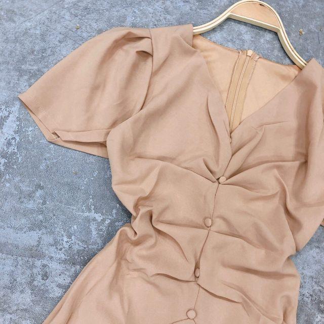 ĐẦM XÒE NUDE CỔ V PHỐI NÚT NGỰC