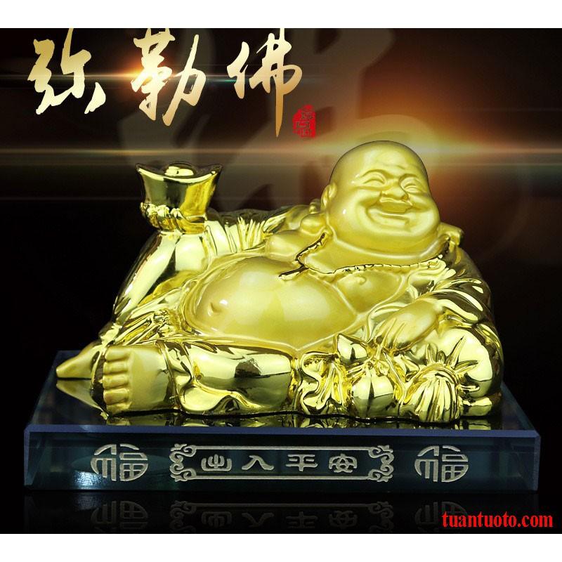 Tượng di lặc để trên ô tô