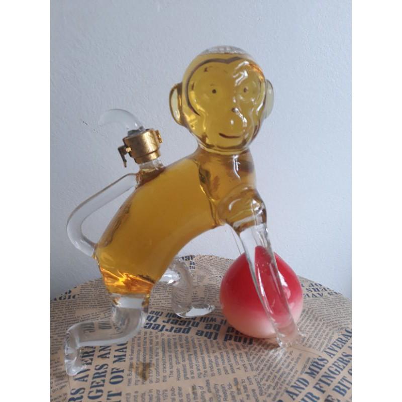 Bình đựng ruou hình con khỉ ôm quả đào
