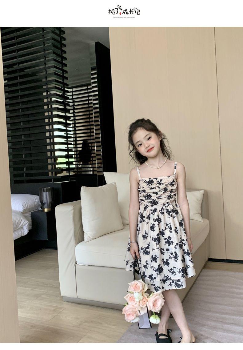 SHUANGYAN Yuanbaoth trẻ em ăn mặc thời trang phù hợp với phong cách phương Tây mùa xuân ăn mặc trẻ em gái mảnh hoa sling váy dệt kim áo choàng