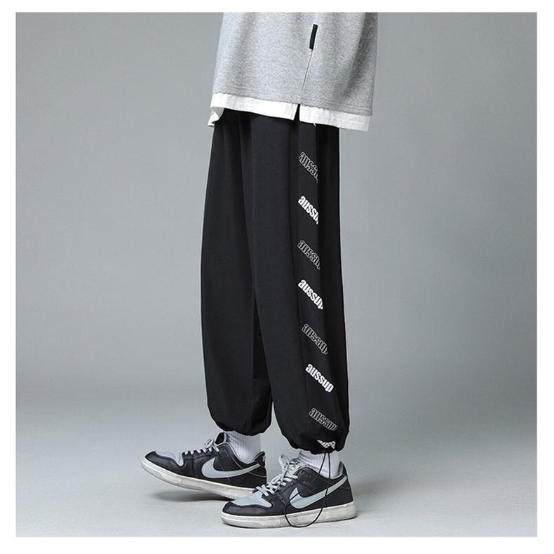 Quần jogger unisex ́ ̉ ̣̂ Quần ống rộng có dây rút ở gấu chất Umi thể thao, chất lì không xù