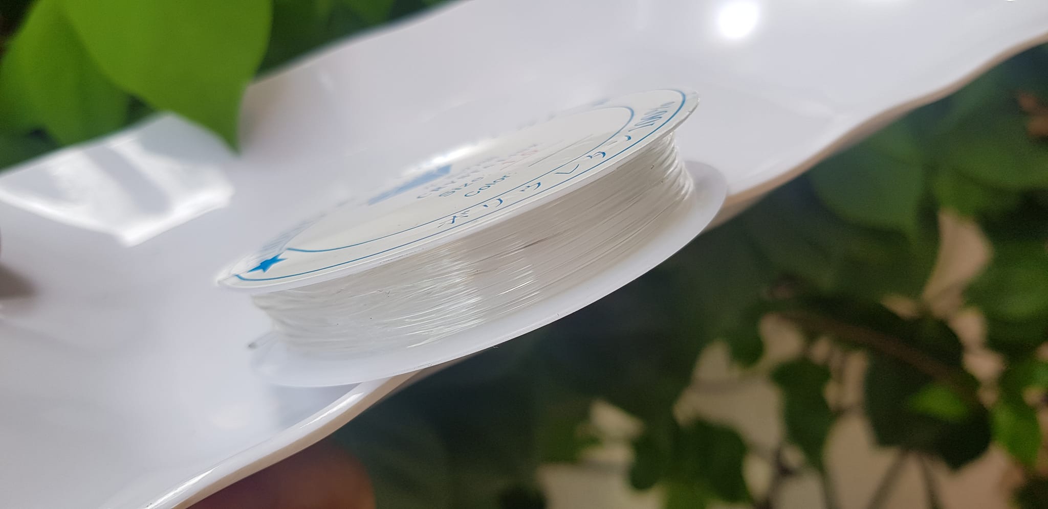 Khoanh tròn cuộn Thun Dẻo Màu trắng nhỏ chuyên xỏ tất cả vòng đeo tay Thun dẻo trắng xỏ vòng tay nam nữ ạ