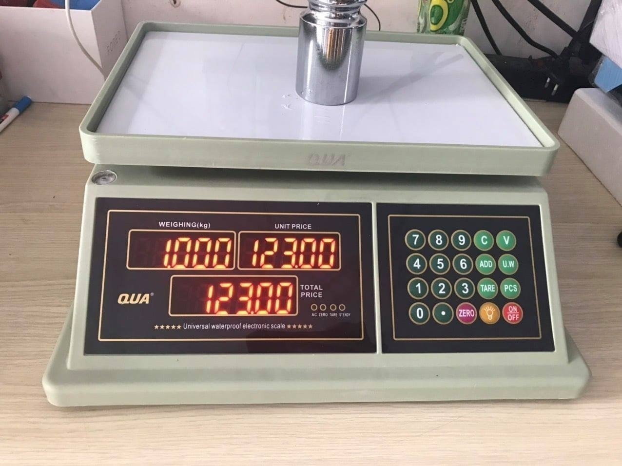 Cân điện tử tính giá QUA