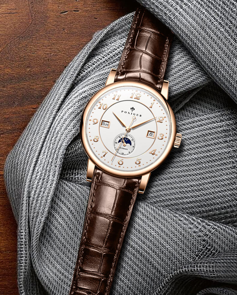 Đồng hồ nam Poniger P915-1 Chính hãng ,Kính sapphire nguyên khối ,chống xước,chống nước 50m,mặt trắng vỏ vàng hồng dây da nâu ( đen) xịn,vỏ máy thép không gỉ 316L,Đồng hồ cơ (Automatic) bảo hành 24 tháng, hàng mới 100%,thiết kế trẻ trung và sang trọng