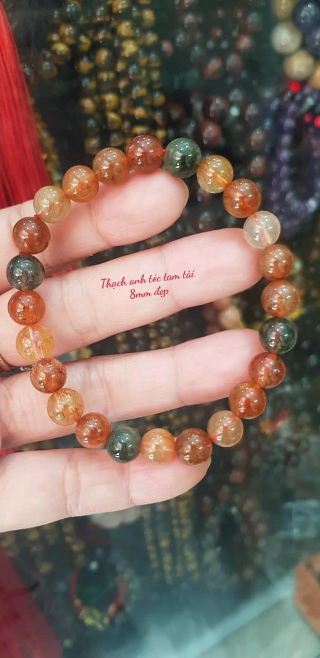 Vòng tay phong thuỷ may mắn đá thạch anh tóc tam tài màu bóng đẹp lắm size hạt vòng 8mm đá tự nhiên đeo tốt sức khoẻ, may mắn, tốt cho công việc đeo lên tay bóng đẹp màu rất xinh đẹp ạ