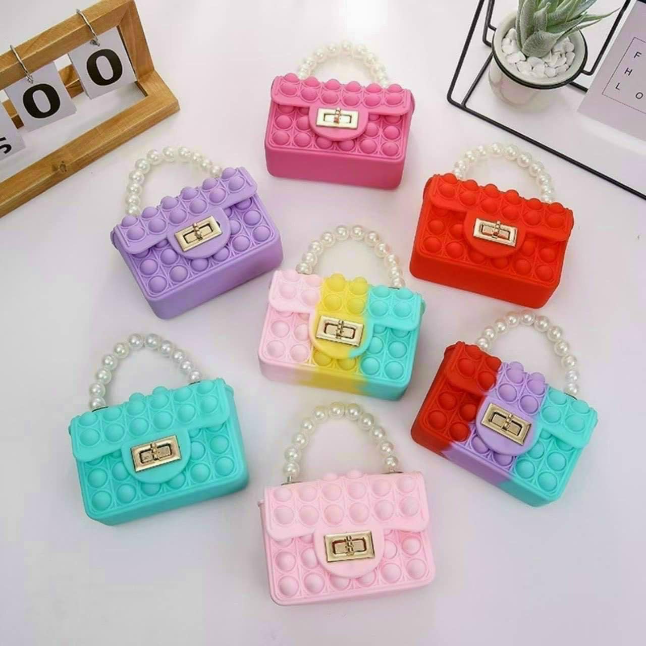 Túi đeo chéo cầm tay sinicon siêu kute