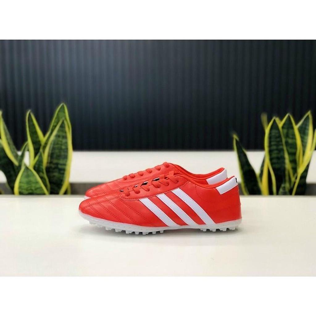 Đôi giày đá sân cỏ nhân tạo có đinh giày đá bóng