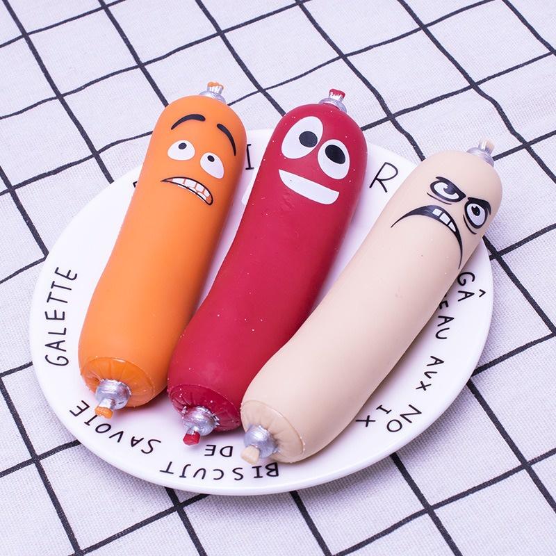 Squishy hình cái xúc xích cát kéo dài biểu cảm ngộ nghĩnh đáng yêu