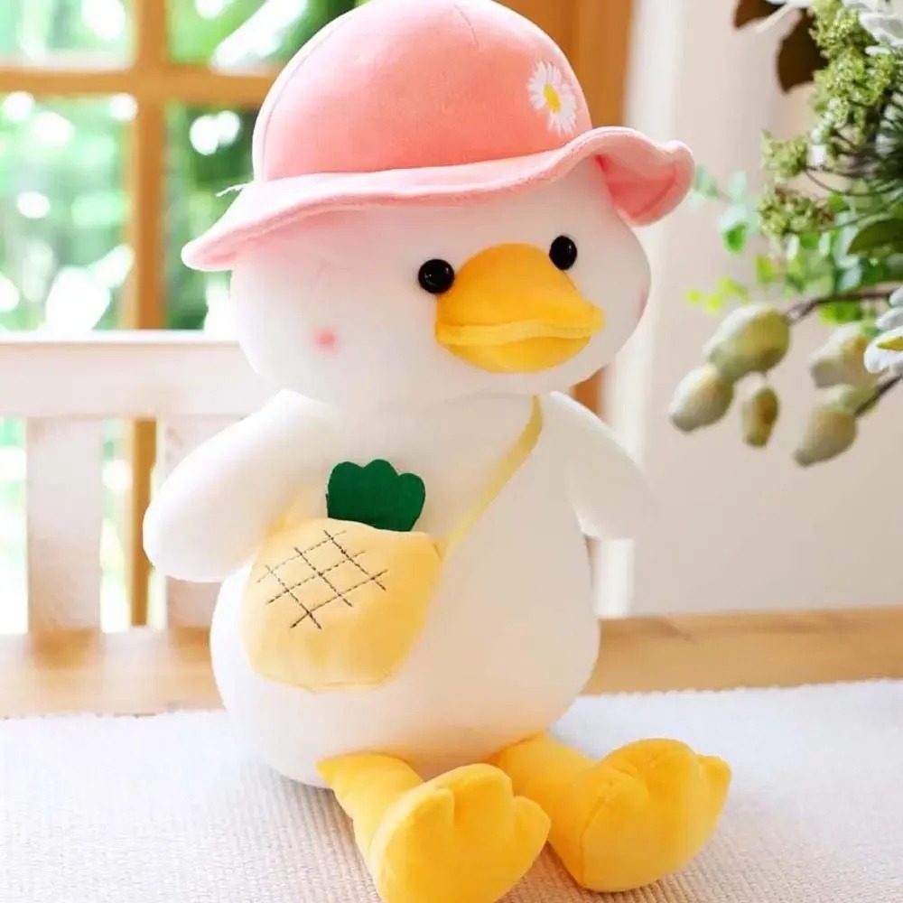Thú nhồi bông vịt đeo túi đáng yêu - Size 22cm - Quà tặng gấu bông vịt đội nón êm mịn