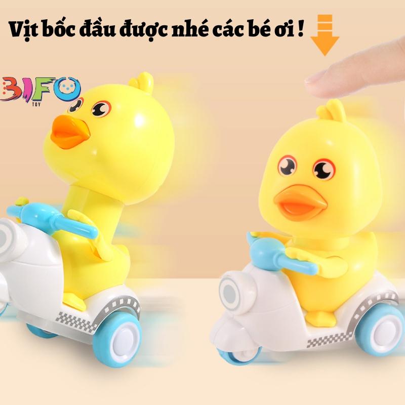 Đồ chơi vịt con đi xe máy vịt lái vespa đáng yêu ấn là chạy đồ chơi cót chạy đà quán tính kích thích trẻ vận động