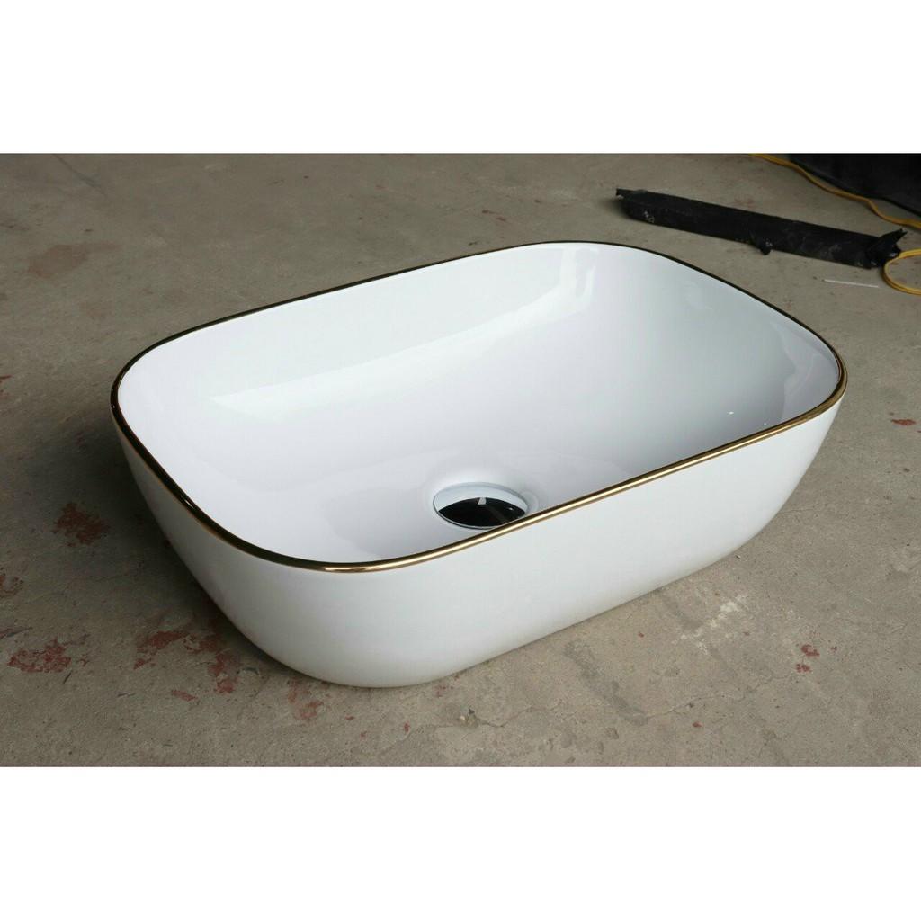 lavabo đặt bàn viền vàng