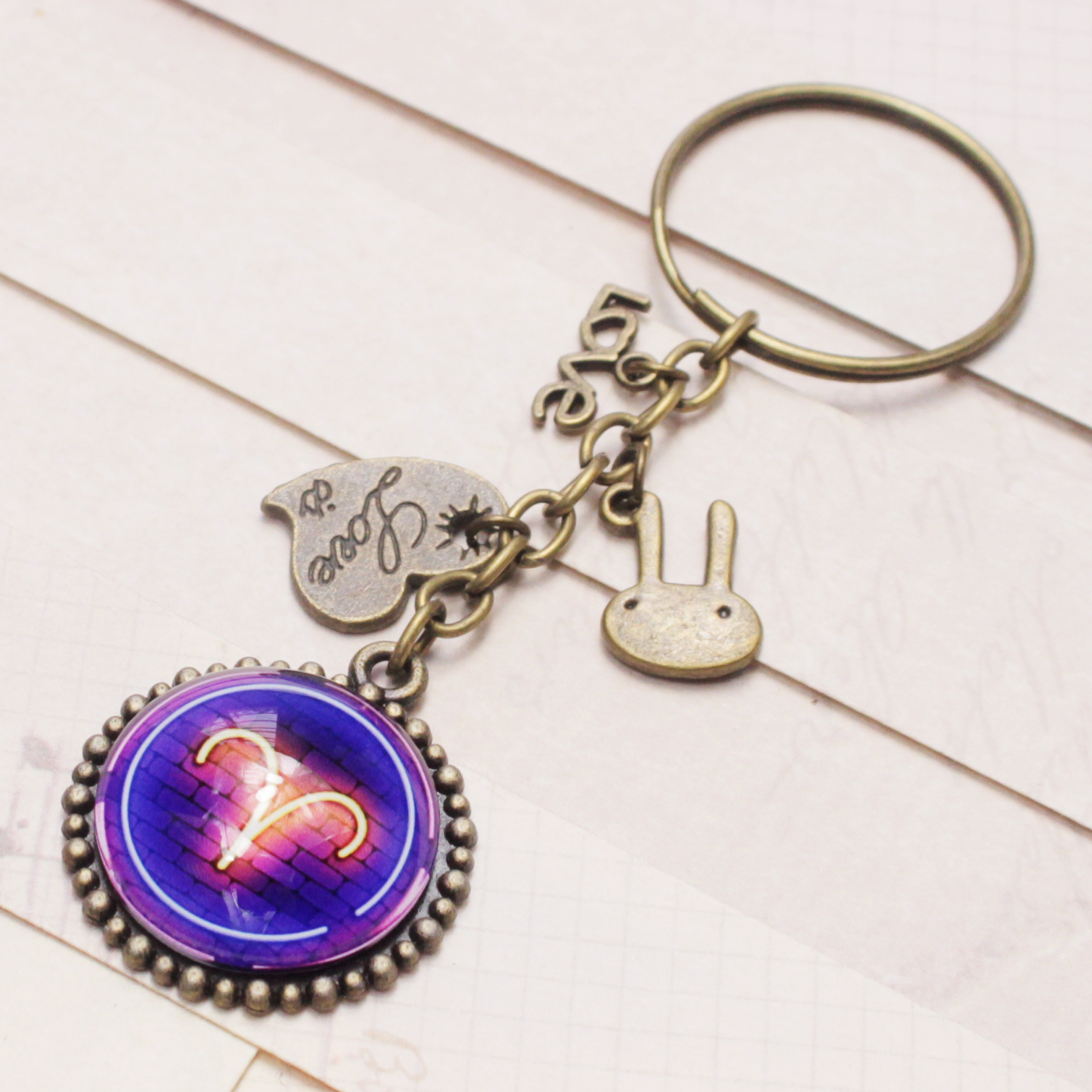 Móc khóa 12 cung hoàng đạo Zodiac màu sắc tươi sáng ánh tím siêu đẹp 06646-MK0032