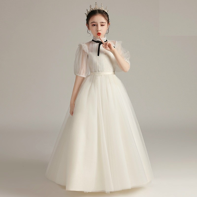 DBG063 - Váy đầm công chúa bé gái trắng tay phồng nơ đen