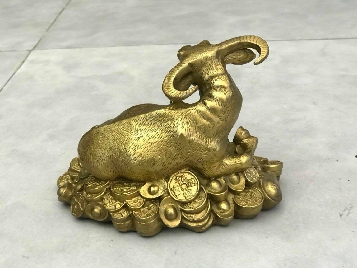 Trâu nằm tiền bằng đồng