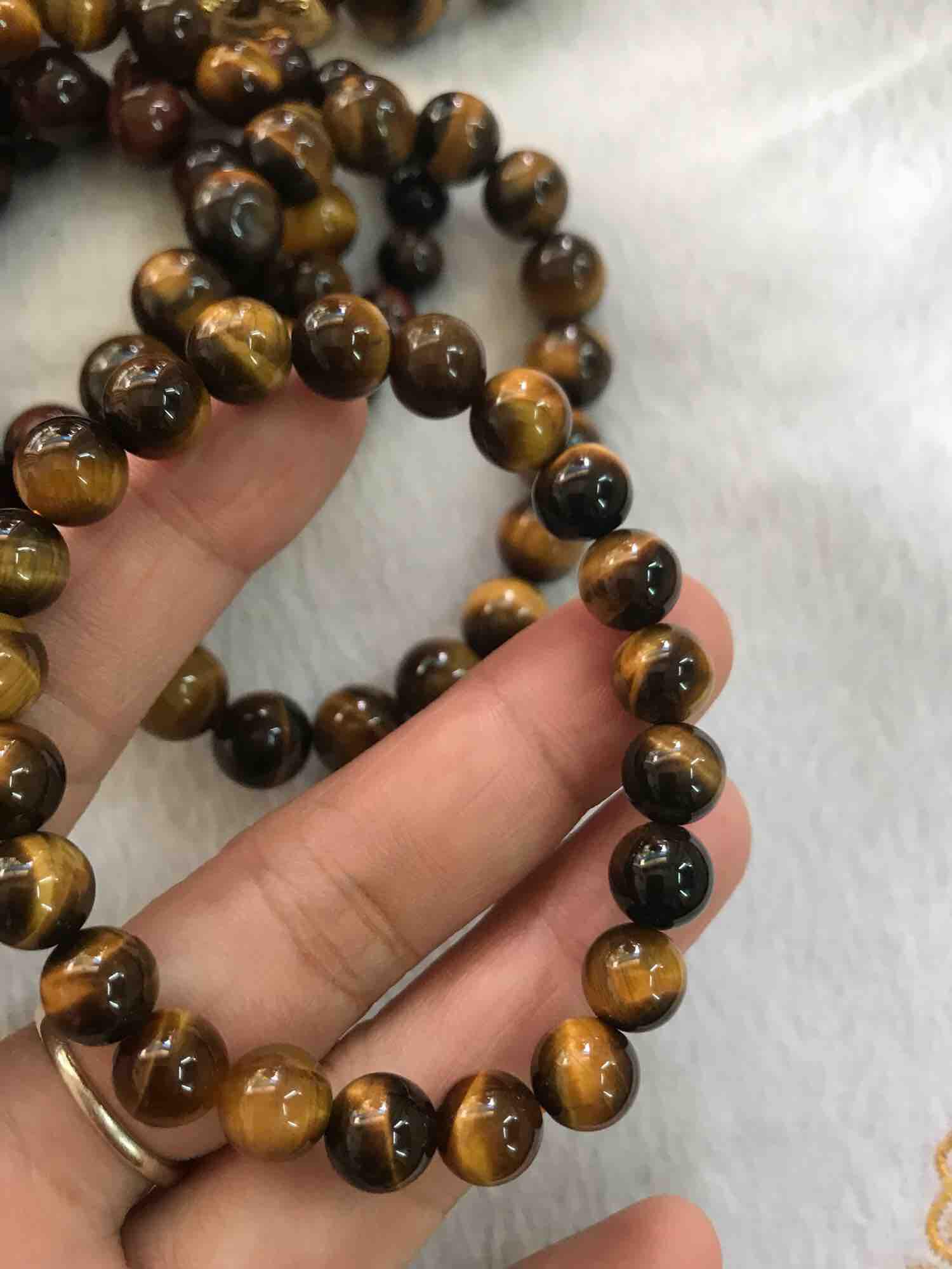 CHIẾC VÒNG TAY MAY MẮN NỮ MỆNH THỔ KIM 8MM ĐÁ MẮT HỔ VÀNG NÂU ĐẬM