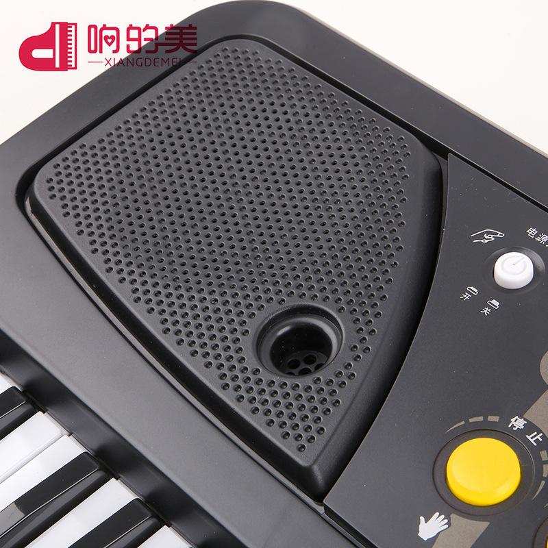 Khuyến mại âm thanh đẹp đàn organ điện tử 61 phím dành cho trẻ em quà tặng giáo dục đồ chơi thông minh có micrô đàn piano