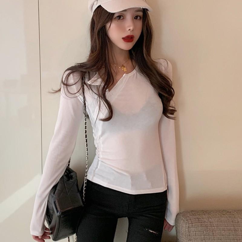 Áo thun nữ tay dài phối nút màu trơn