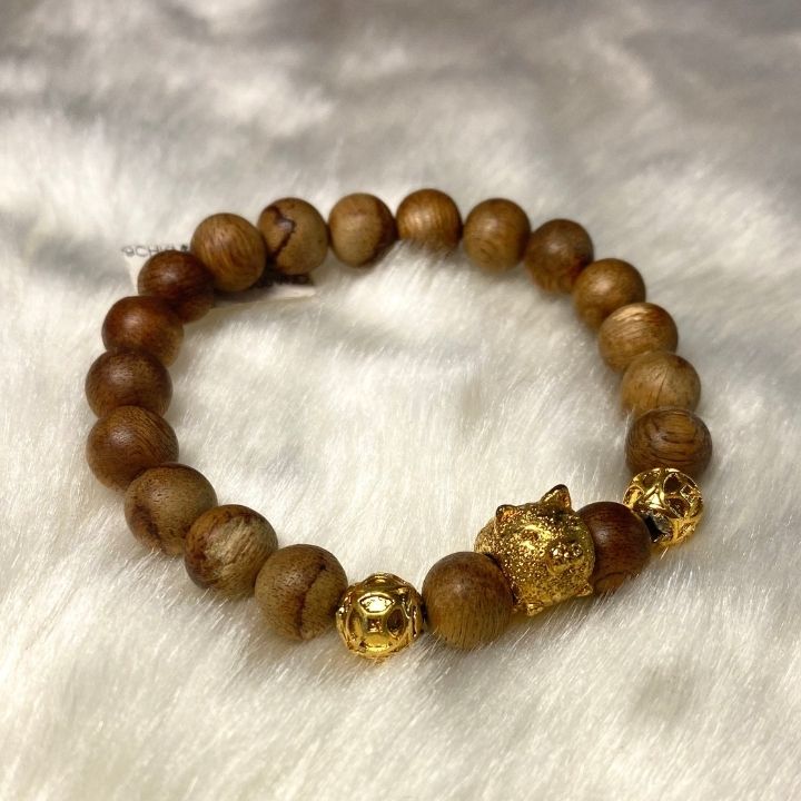 Vòng Tay Trầm Hương 8ly Mix Charm Con Heo Vàng Kim Mã