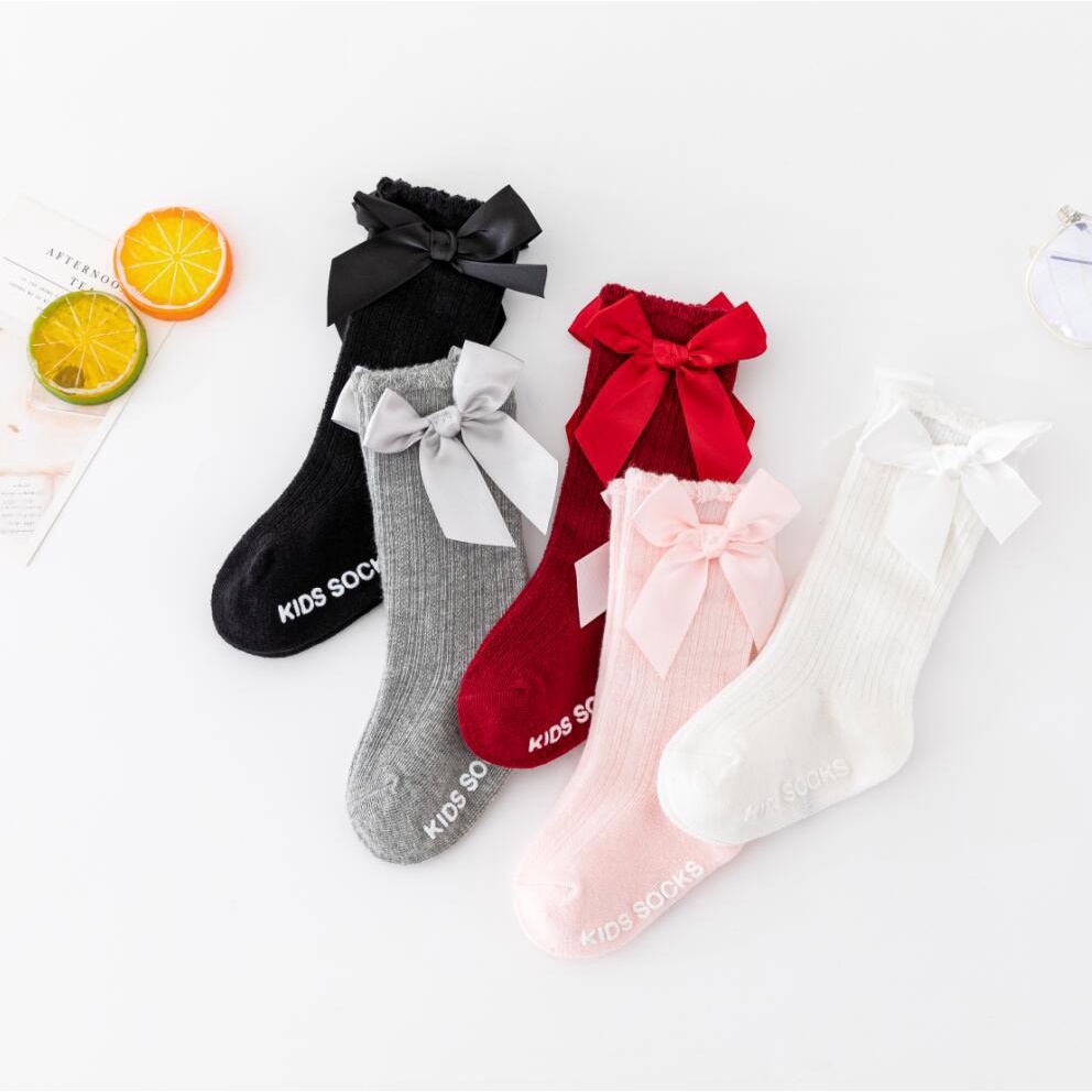 Một đôi tất ,vớ cotton dài mềm mại chống trượt đến đầu gối phối ren thắt nơ công chúa cho bé gái mẫu cực hót năm 2022