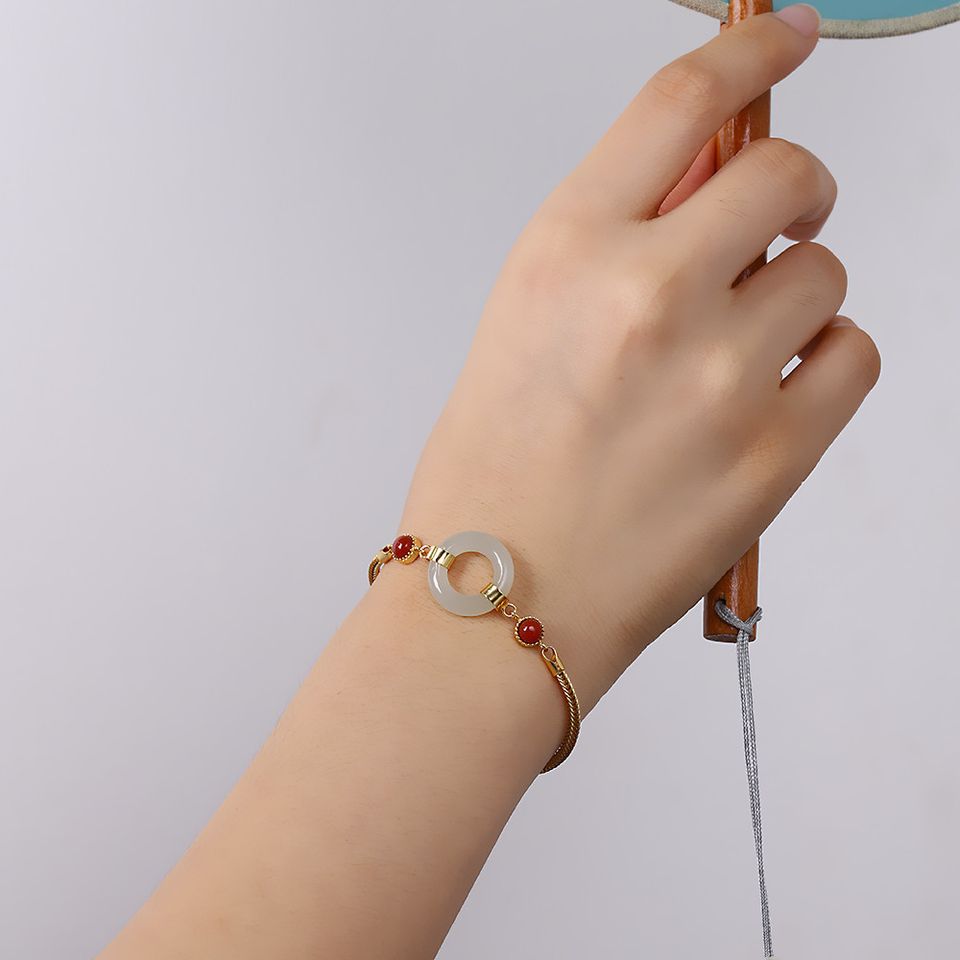 Vòng tay ngọc bích trắng đồng điếu bình an
