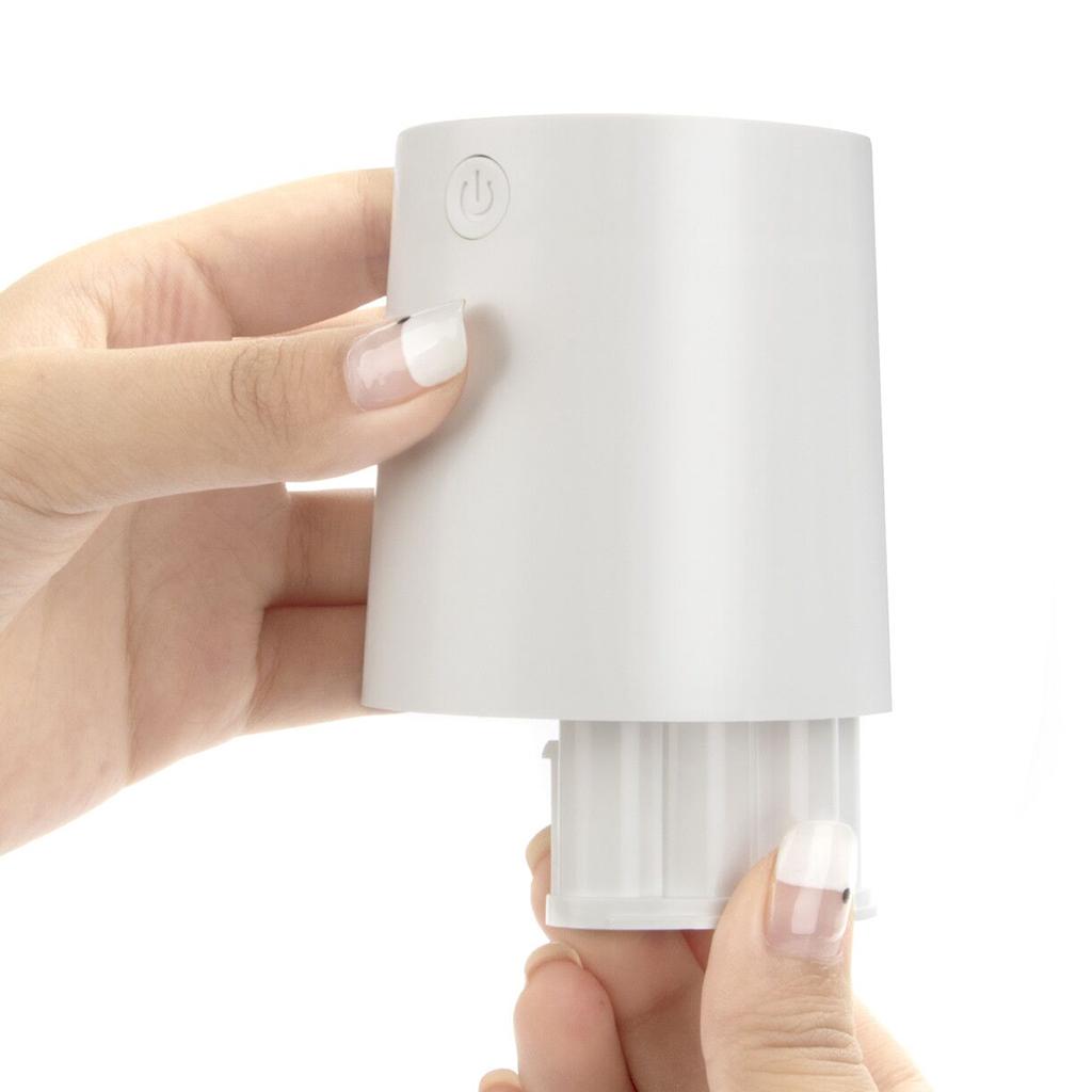 Máy khử trùng tay cảm ứng tự động với bình cồn dung tích 150ml tích hợp xịt xà phòng dùng pin tiện lợi