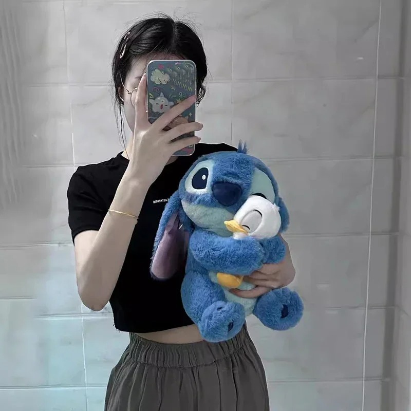 Thú nhồi bông Stitch ôm vịt đáng yêu - Size 22cm - Gồm 1 Stitch và Một Bé Vịt Rời Cute