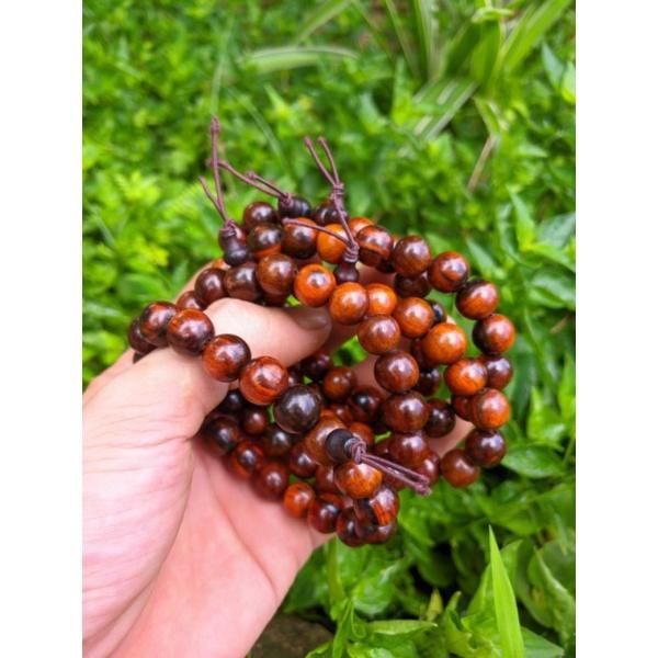 Vòng lắc tay Gỗ nữ hạt 10 ly trắc huyết màu đỏ nhiều đẹp long lanh
