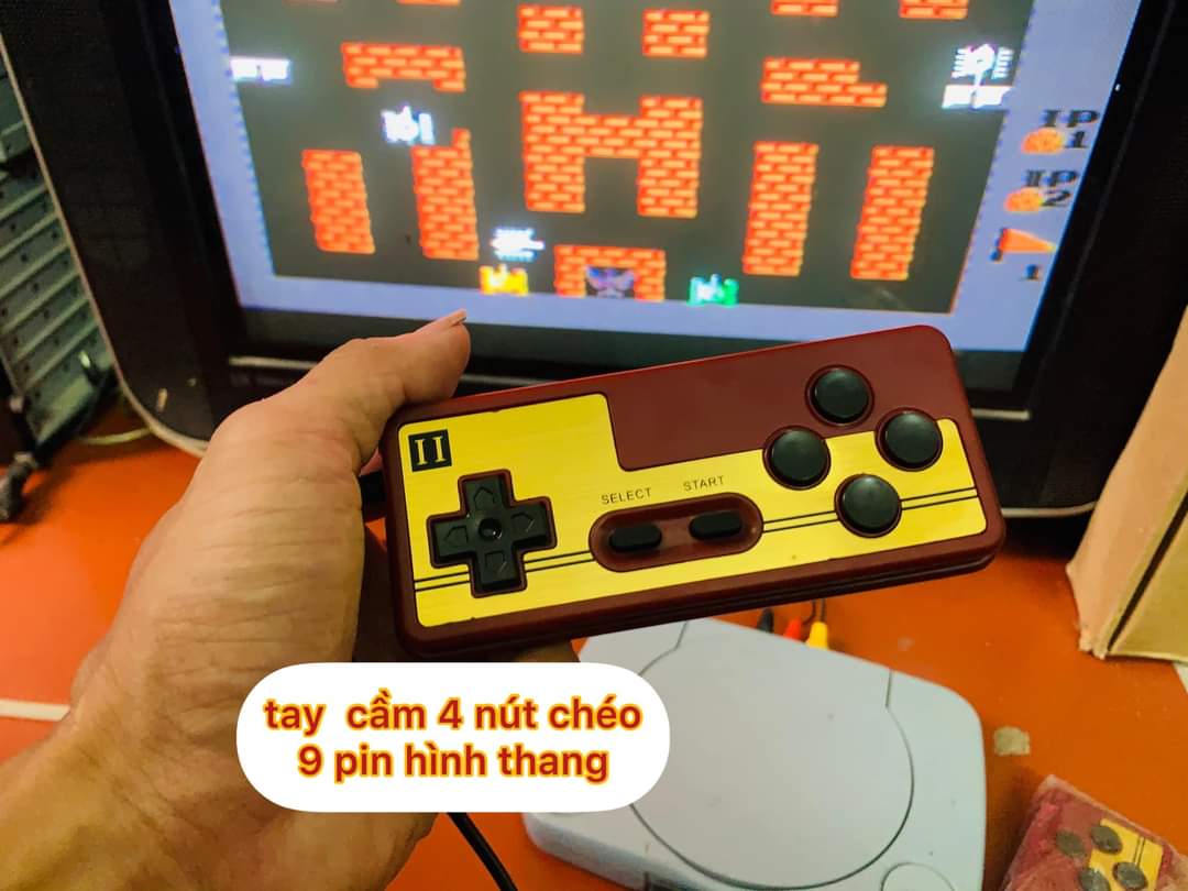 Tay cầm 4 nút 9 pin chân hình thang nút chéo