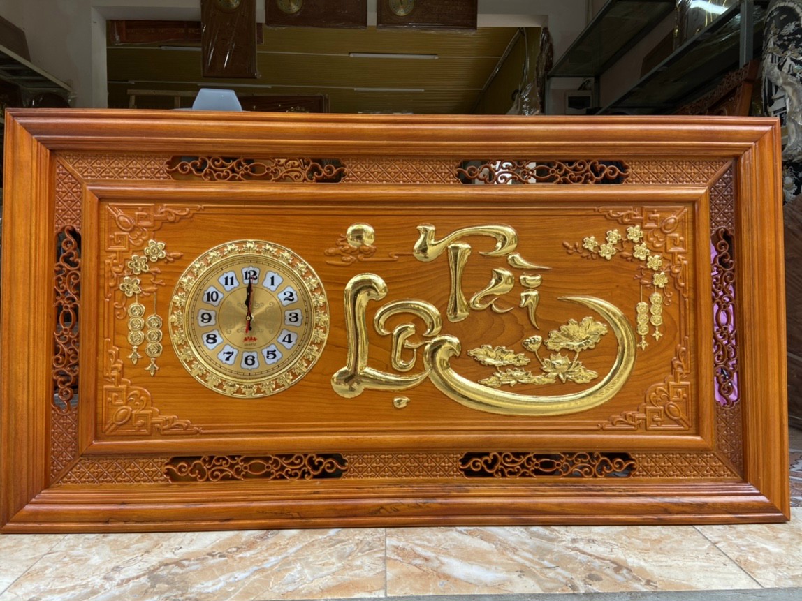 Tranh đồng hồ treo tường trạm khắc chữ tài lộc bằng gỗ gỗ đỏ kt 67×127×4.5cm