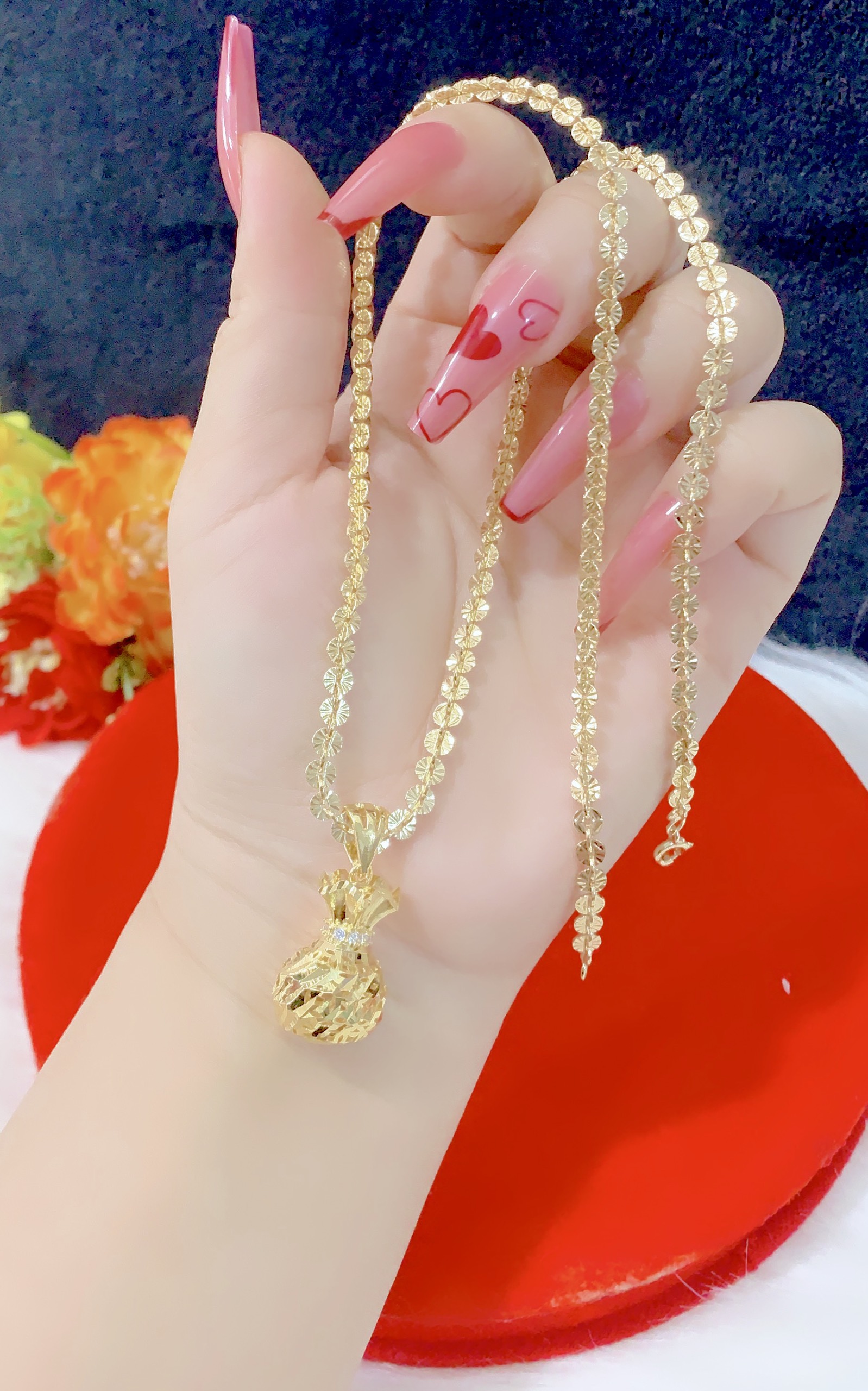 Dây chuyền khoen tròn m,ặt túi .tiền mạ 18.k cưc đẹp