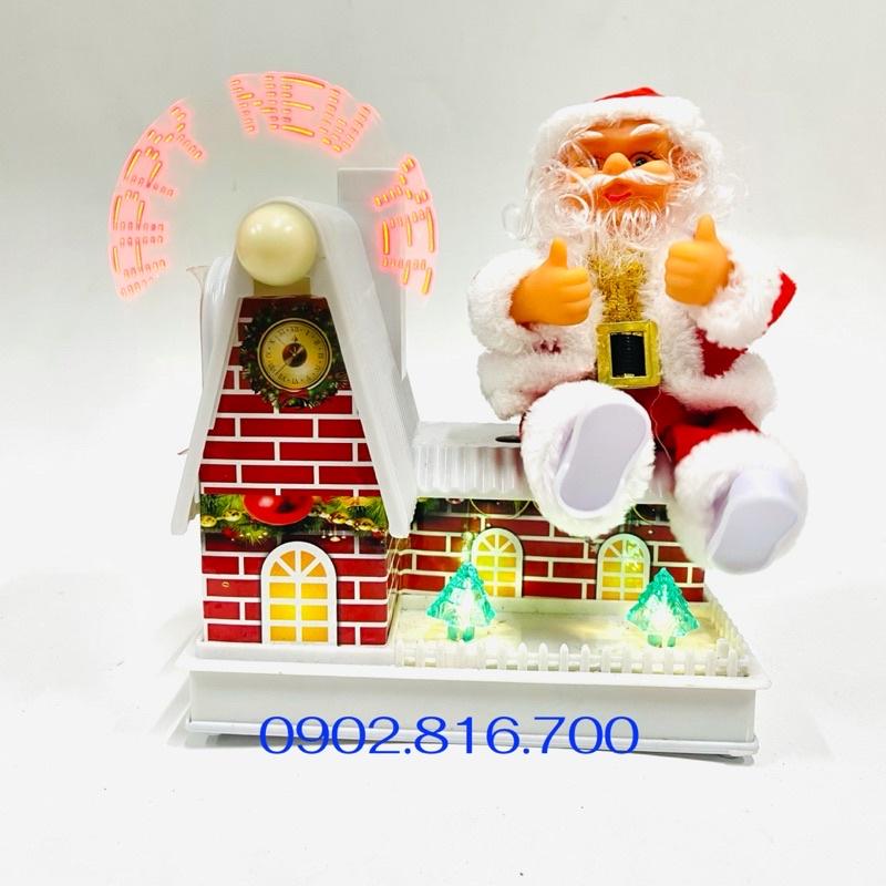 Đồ chơi ông già noel ngồi mái nhà xoay nhạc đèn quà tặng noel giáng sinh cho bé