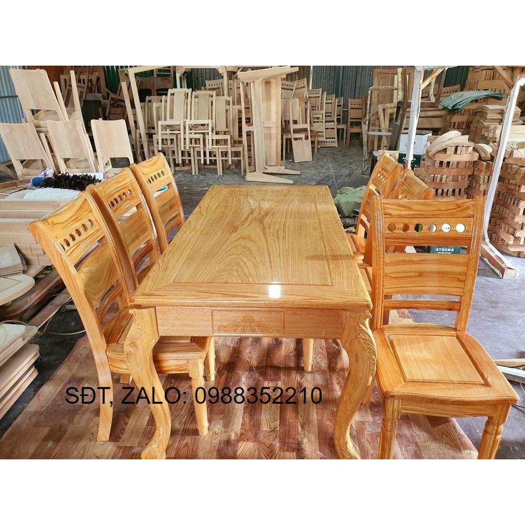 Bàn ăn gỗ gõ