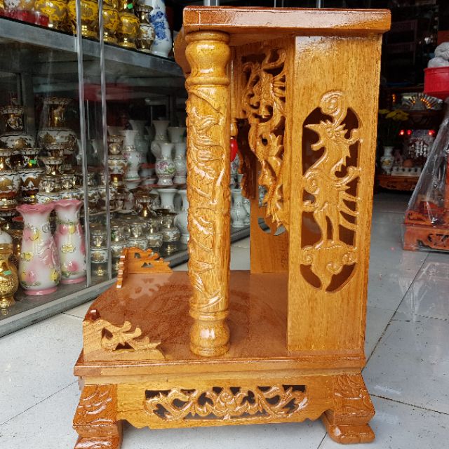 Bàn thờ thần tài ông địa gỗ gõ đỏ ngang 50 cm quỳ trụ