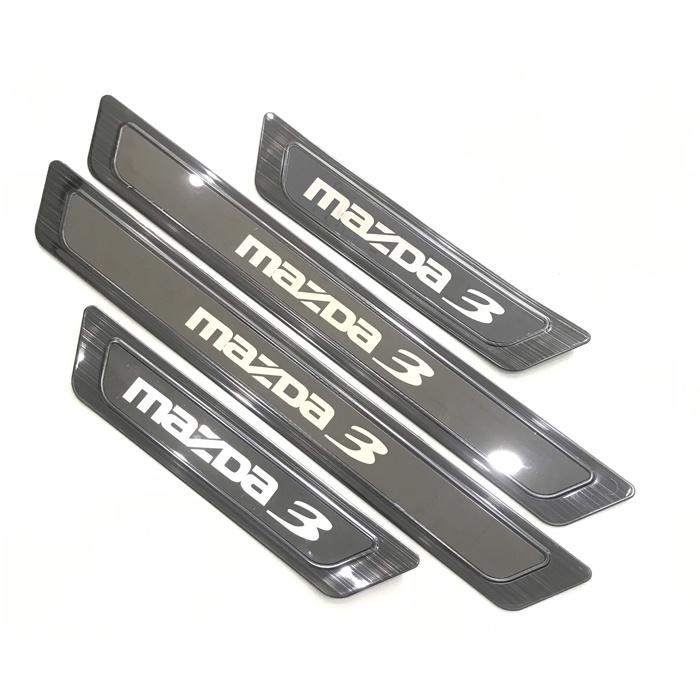 Bộ sản phẩm ỐP BẬC CỐP VÀ BẬC CỬA vân Titan xe Mazda 3 2020