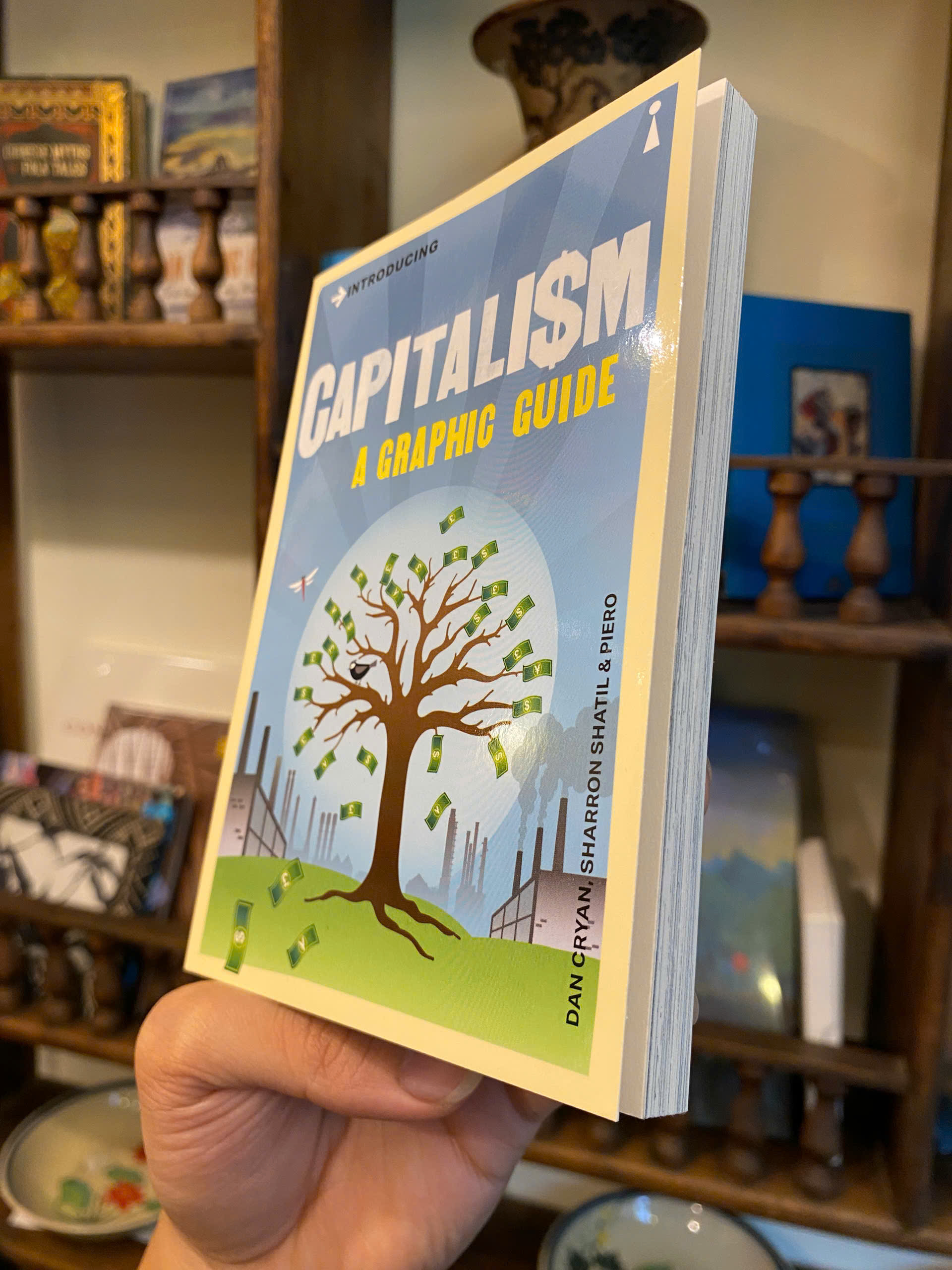 Sách - Capitalism: A Graphic Guide by Dan Cryan - Economics/Nonfiction/ History/English book