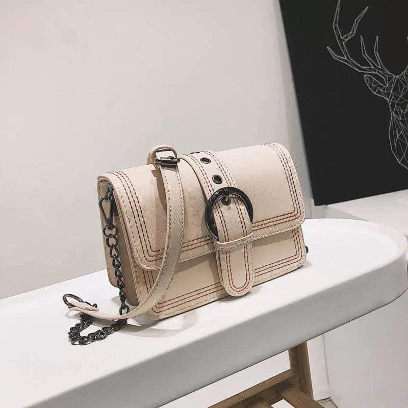 Túi khóa cài đen sữa