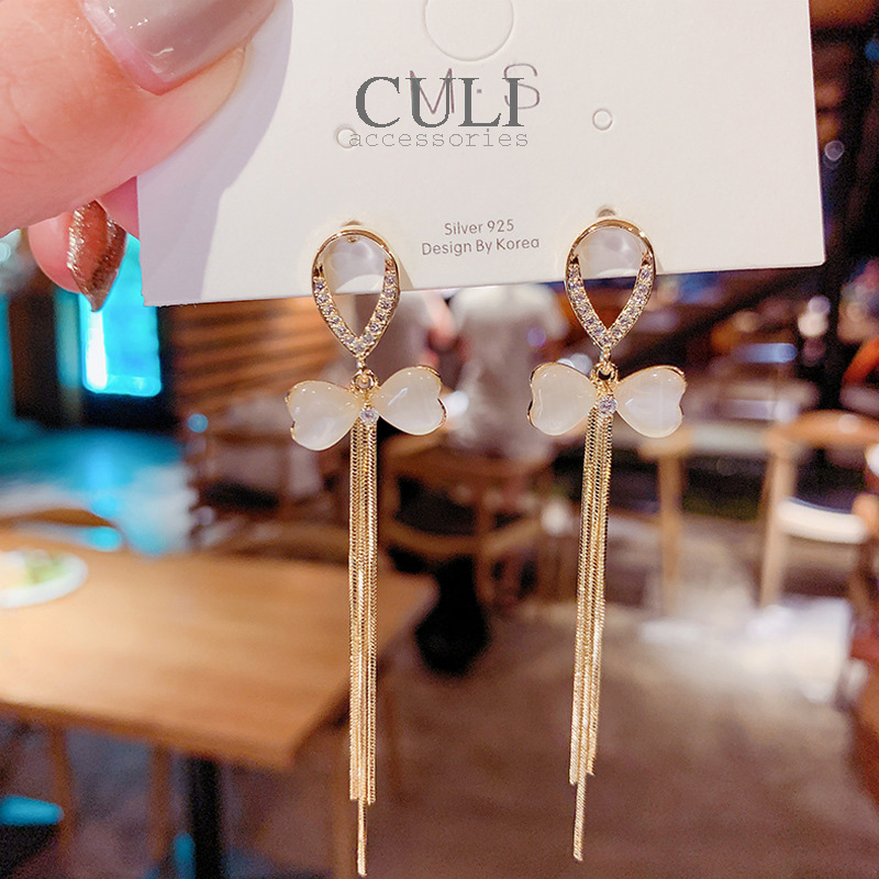 Khuyên tai dáng dài tua rua, hình nơ kết xà cừ HT609 - Culi accessories