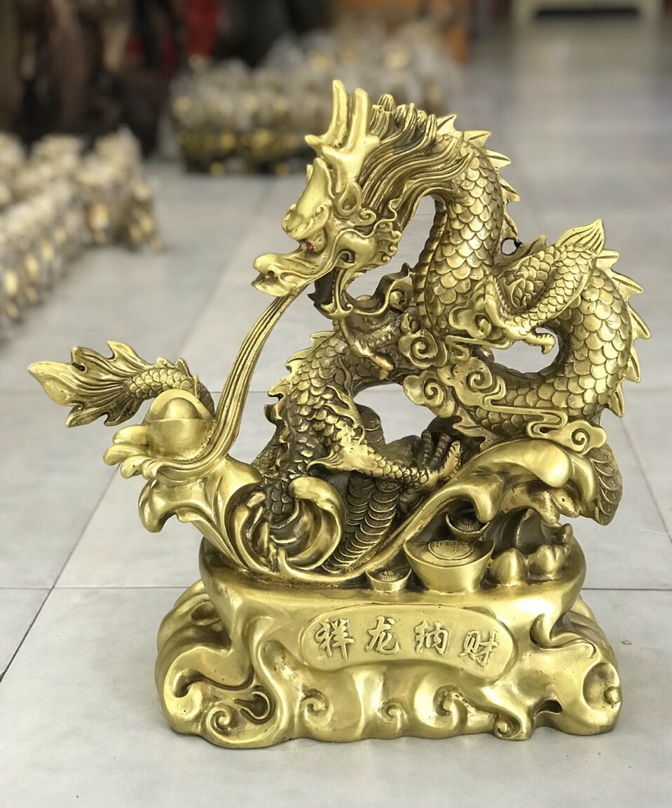 Rồng nhả thỏi vàng bằng đồng cao 42cm
