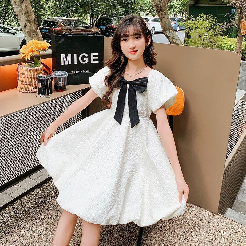 DONGSHOP HOT Cô gái bong bóng nước ngoài tay áo đầm mùa hè 2023 Hàn Quốc trẻ em Bowknot váy công chúa váy mùa hè