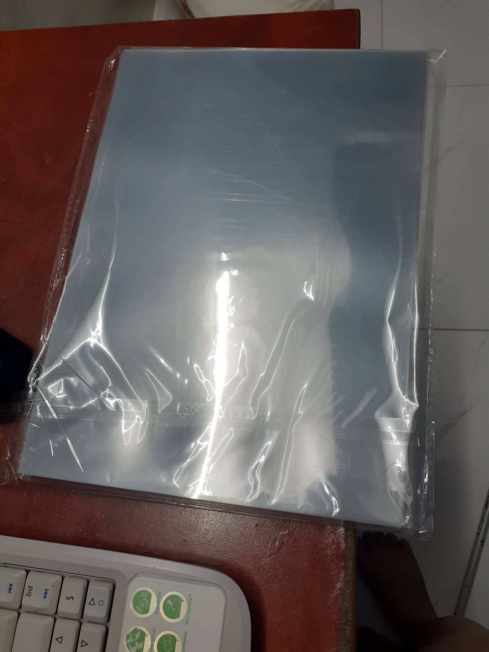 1 xấp bìa kiếng A4 1,5