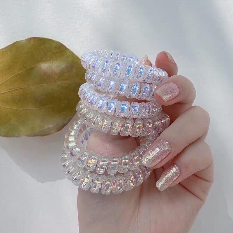 Cột tóc lò xo