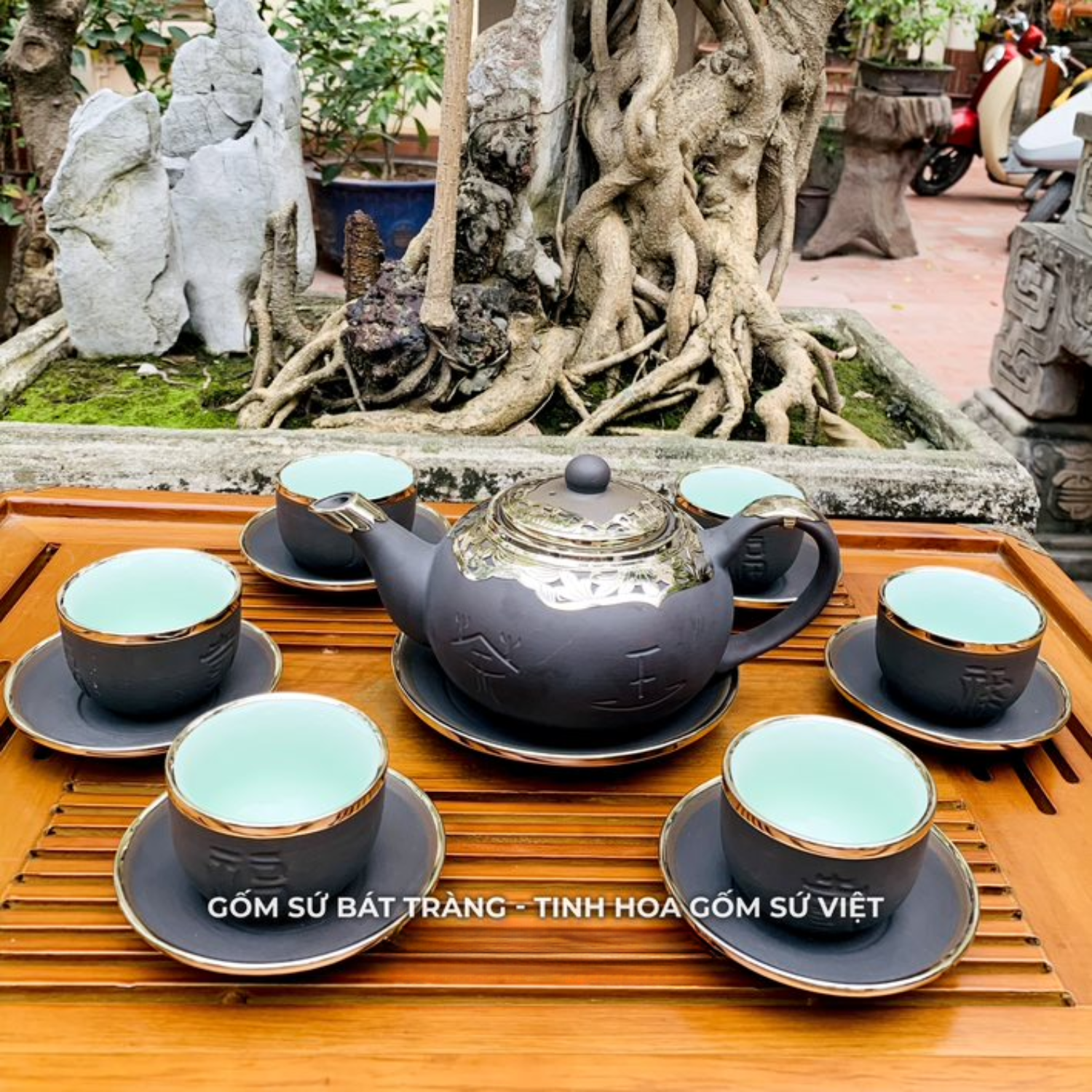 Bộ ấm chén uống trà cao cấp , bộ ấm trà Bát Tràng - trường sa phúc lộc thọ bọc đồng