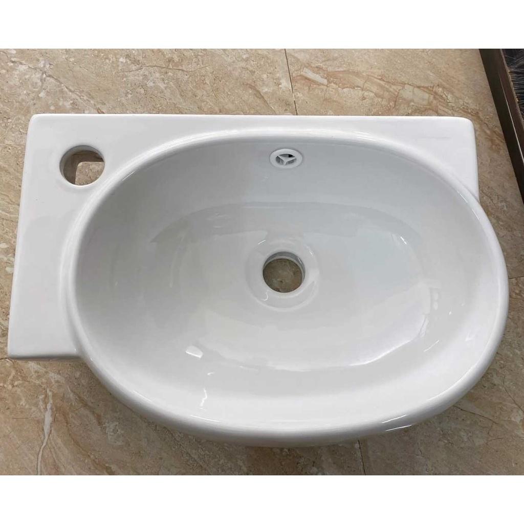 Lavabo góc màu trắng, treo tường nhỏ gọn