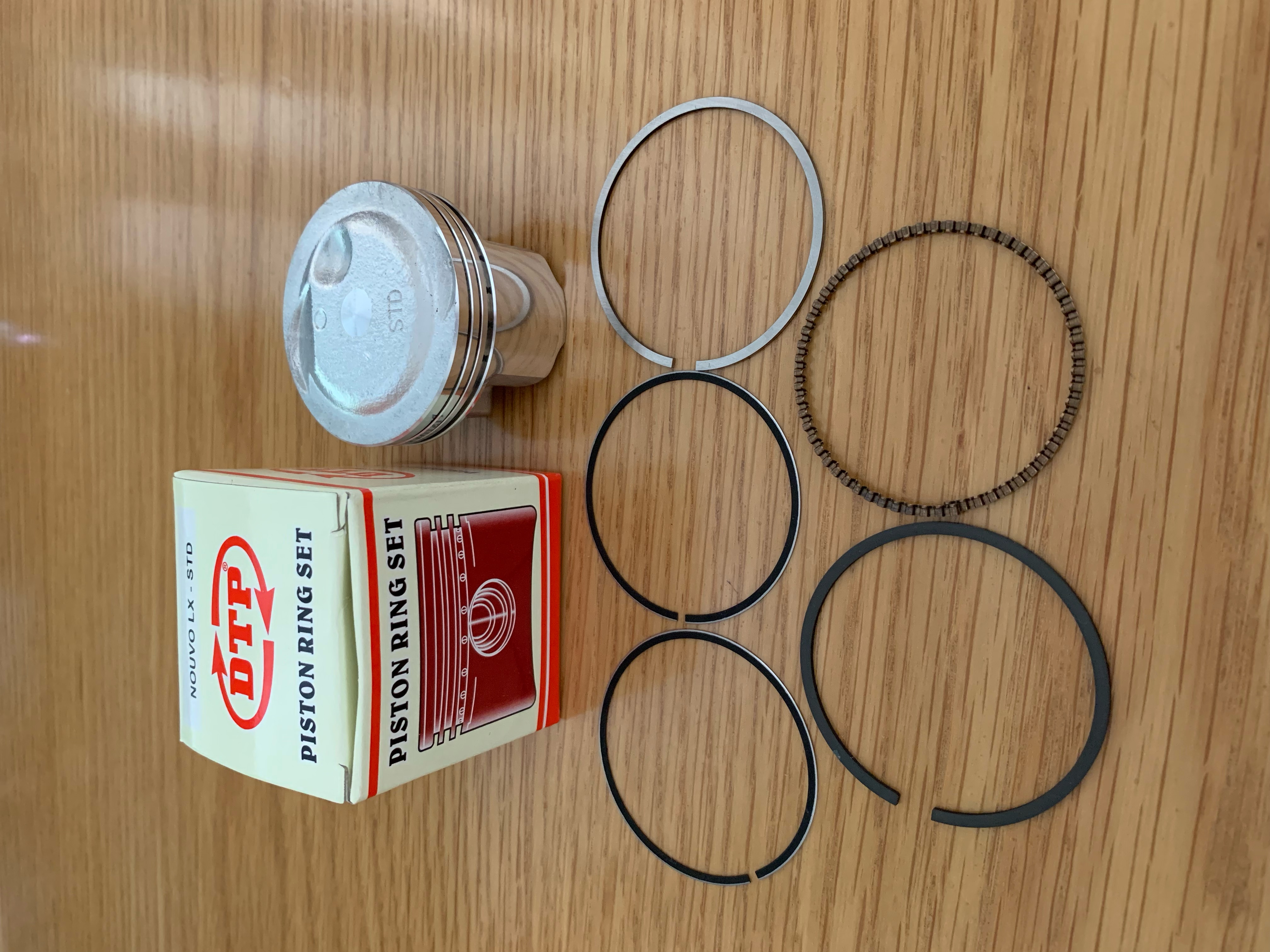 Bộ piston (xéc măng) bạc dành cho xe NOUVO LX (cos 0-4)