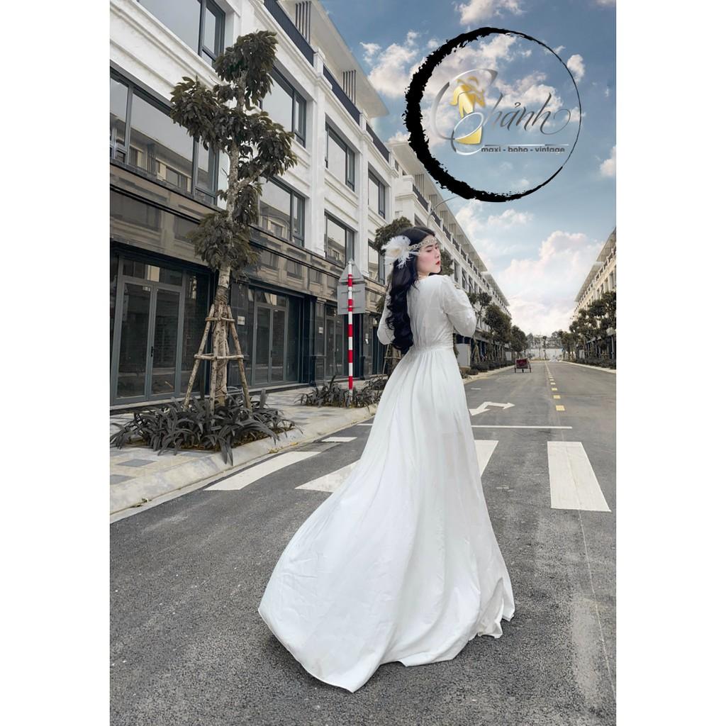 Đầm xẻ tà trắng dài tay cực xang chảnh