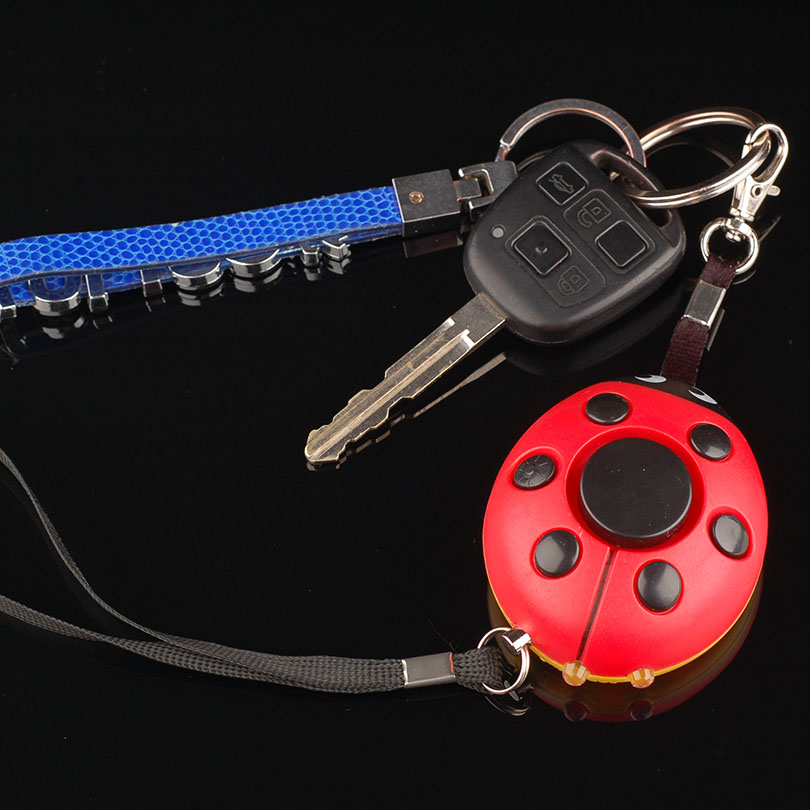 Móc chìa khóa thông minh tích hợp còi hú báo động âm thanh lớn ( Tặng miếng thép 11in1 )