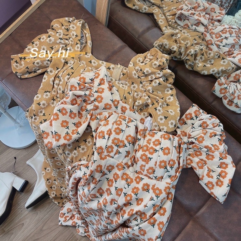 Đầm hoa nhí cổ vuông tay phồng cột nơ lưng tiểu thư