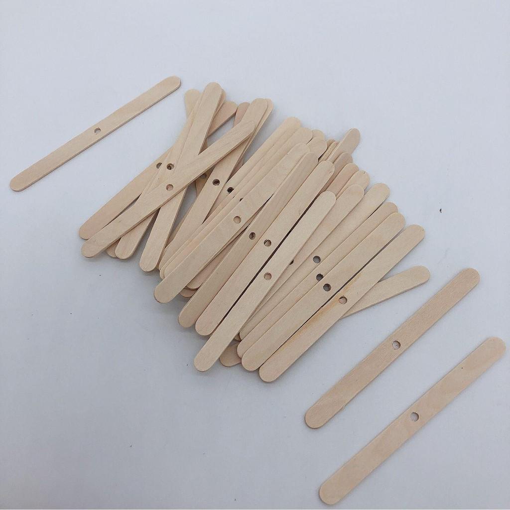 Que gỗ đỡ bấc loại có lỗ